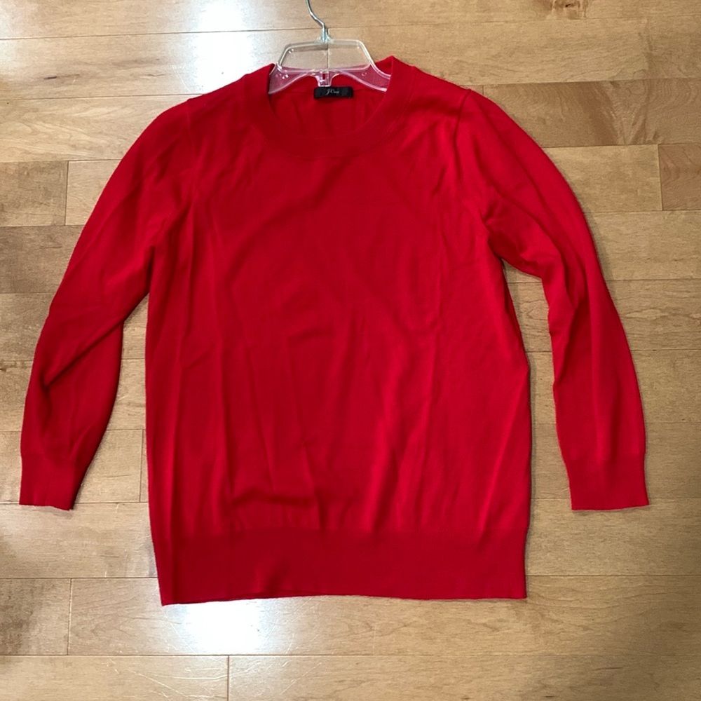 JCrew Tippi. Warm toned, bright red. Great top for work outfits. Merino wool.